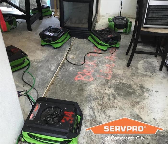 SERVPRO drying equipment setup in a room