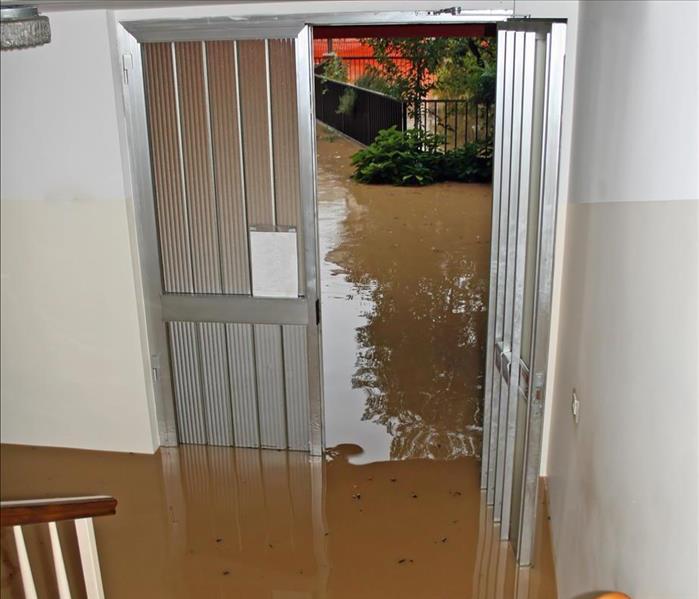 Floodwaters in the entrance of a home