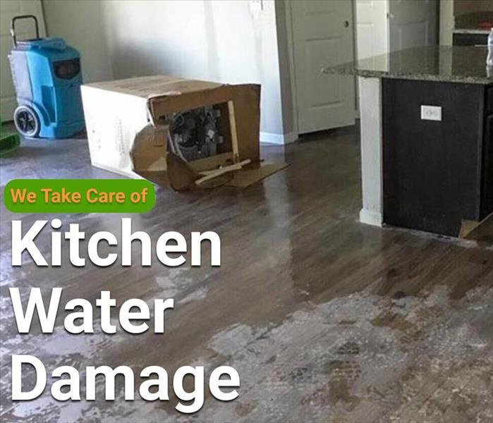 kitchen floor with water building up 
