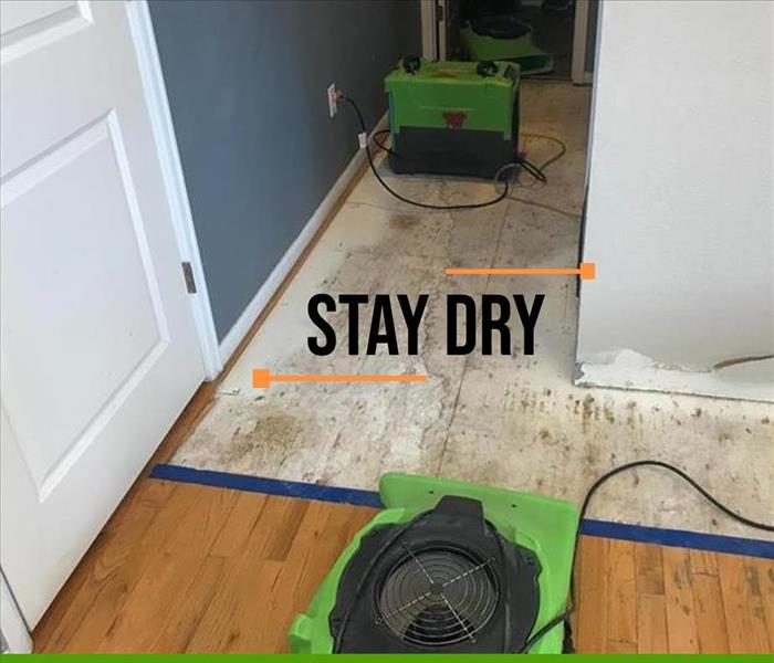 air dryers on floor damaged by water